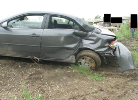 Photo 3 showing damaged vehicle for Case #1A004, caption reads 'Damage to vehicle.'