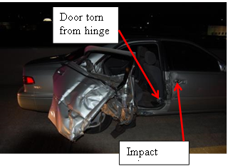 Photo 10 shows damage to vehicle for Case #2B010