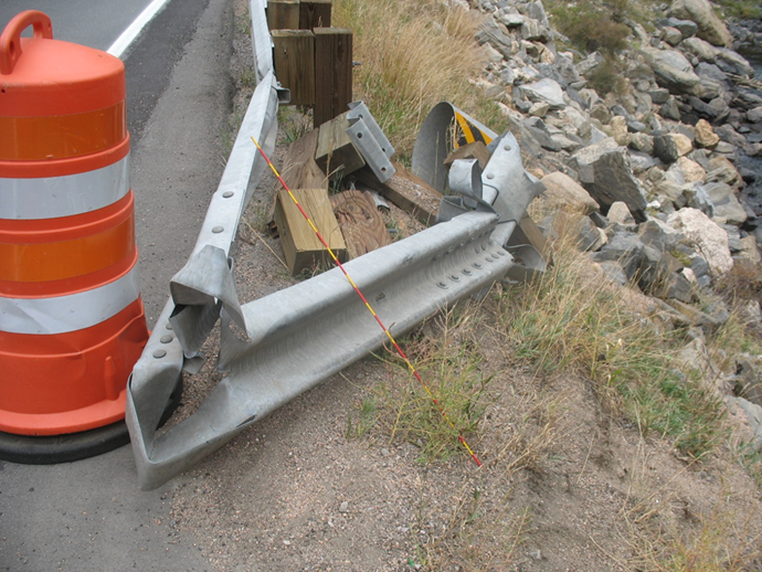 Appendix E –examples of crash cases not forwarded for review by task force Phase 3A Case #25; Photo damaged guardrail did not contain sufficient information to identify vital information.