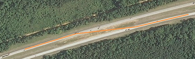 Figure 9. Photo. Aerial view of southern crossover. Southbound traffic shifts back to normal operation. Figure 9. Photo. Aerial view of southern crossover. Southbound traffic shifts back to normal operation.
