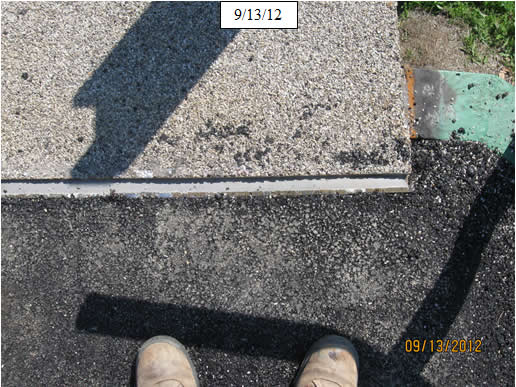 Figure 29. Photo. Install two-part pourable joint material per manufacturer’s instructions.