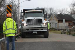 d) Photograph of truck on load path BN, load case 2