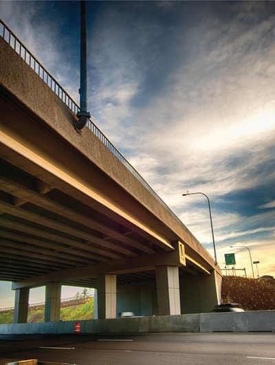 Figure 50. Photo. Completed demonstration bridge (photo courtesy of the Precast/Prestressed Concrete Institute). A view of the completed bridge.