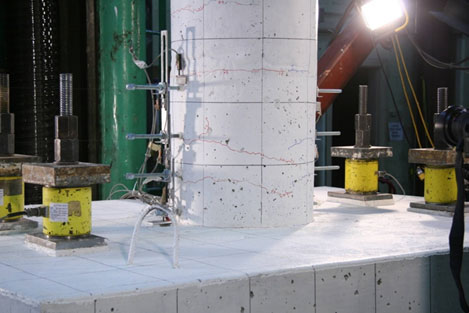 Photo shows flexural cracks in the precast column.