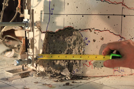 Photo shows first significant spalling, which occurred in cycle 7-1.
