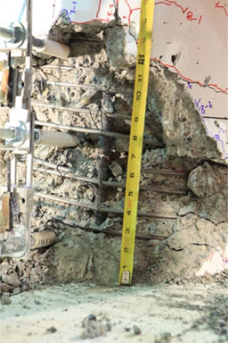 Photo shows N-NE bar fractured on the north side of specimen SF-2.