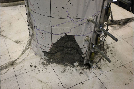 Full spalling was reached in cycle 9-1. Full spalling reached 8 inches above the column-to-spread footing interface.