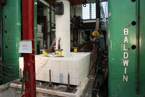 This photo shows the column-to-footing test specimen in the test setup.