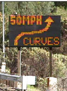 Image: Speed warning sign for curves in the Sacramento River Canyon