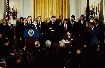 President Reagan signs the STAA in 1982.