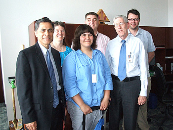 Back row, left to right: Julieanna Purdue, Craig Barnes (Heni's Father), and Walter Purdue (Heni's student advisor). Front row, left to right: Administrator Victor Mendez, Heni Barnes, and FHWA's Richard Weingroff.