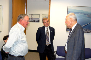 From left to right: Former Assistant Division Administrator Harry Bennetts, current Assistant Division Administrator Mike Canavan, and Former U.S. DOT Secretary Boyd.