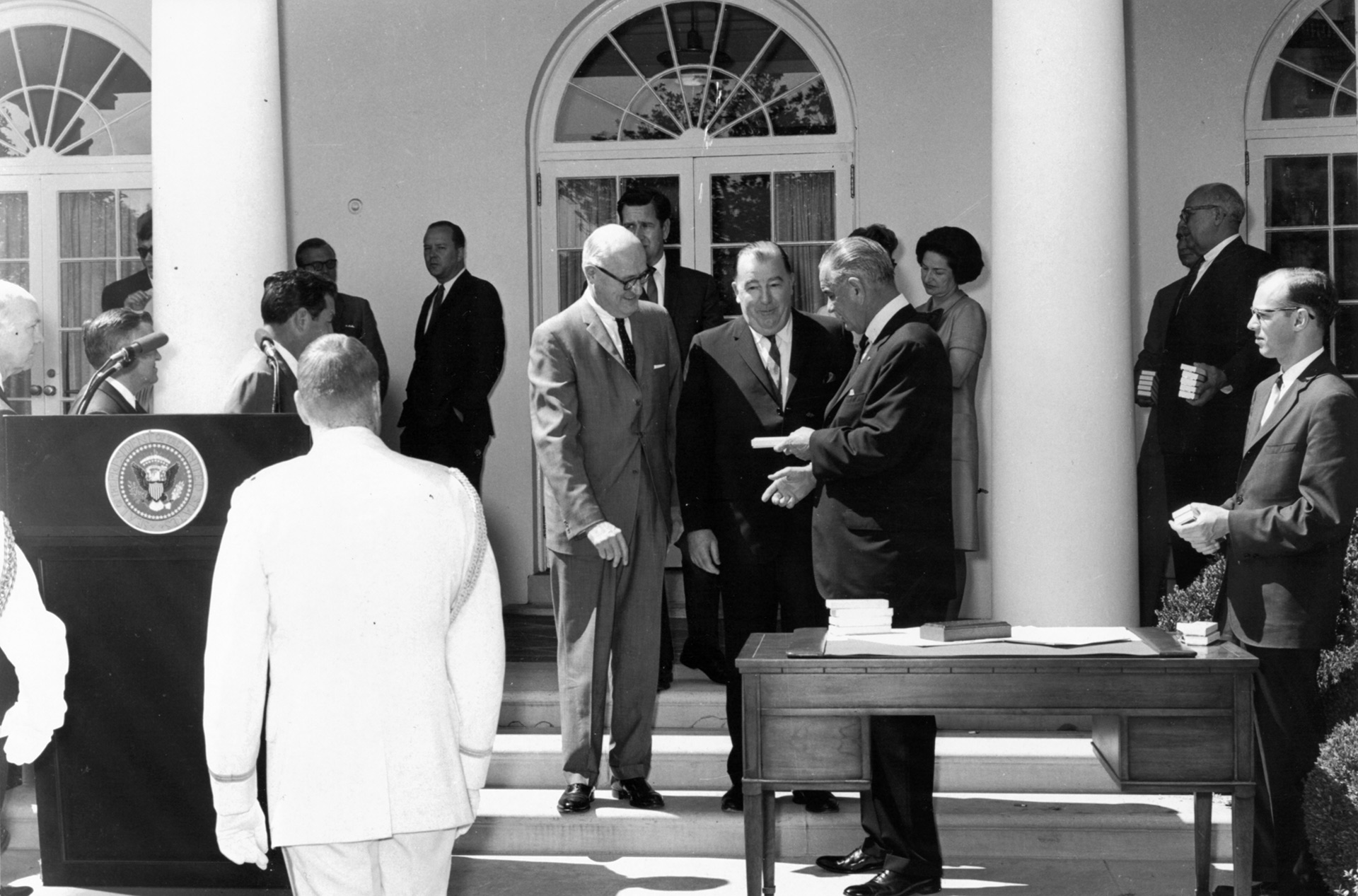 President Lyndon B. Johnson signing the Motor Traffic and Motor Vehicle Safety Act and the Highway Safety Act.