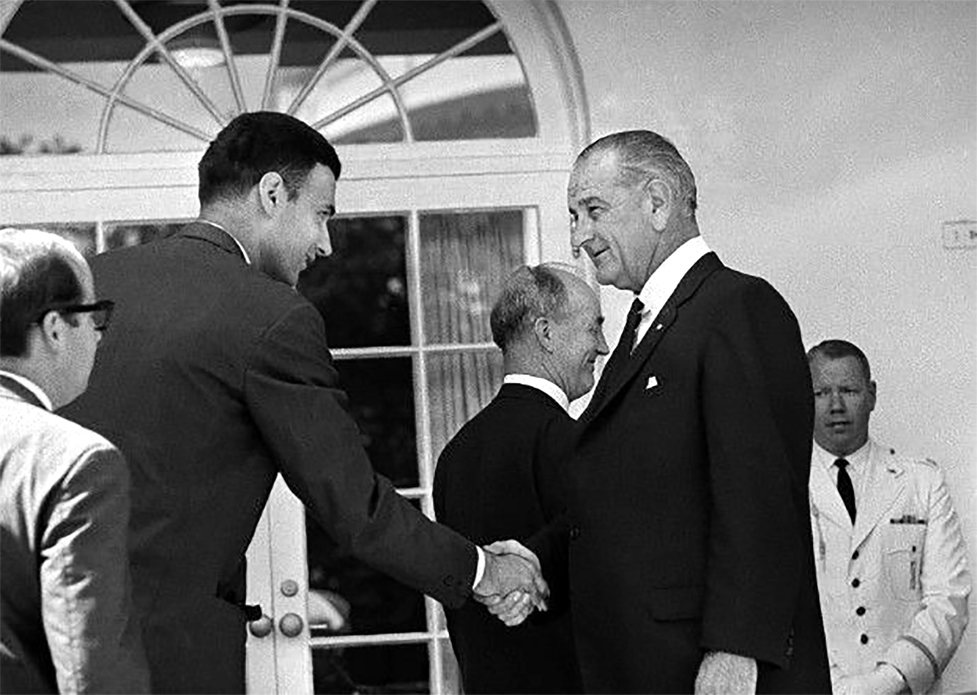 The Washington Post reported on the signing ceremony: 'Sitting inconspicuously near the back was Ralph Nader,' described as the “gadfly who is generally credited with arousing public demand for safer automobile design.”  After the signing, Nader was near the end of the greeting line.  The President had long since run of pens used to sign the two bills, but a White House aide gave Nader a White House ceremonial pen.  According to The New York Times, 'The President shook Mr. Nader’s hand briefly without any sign of recognition.'