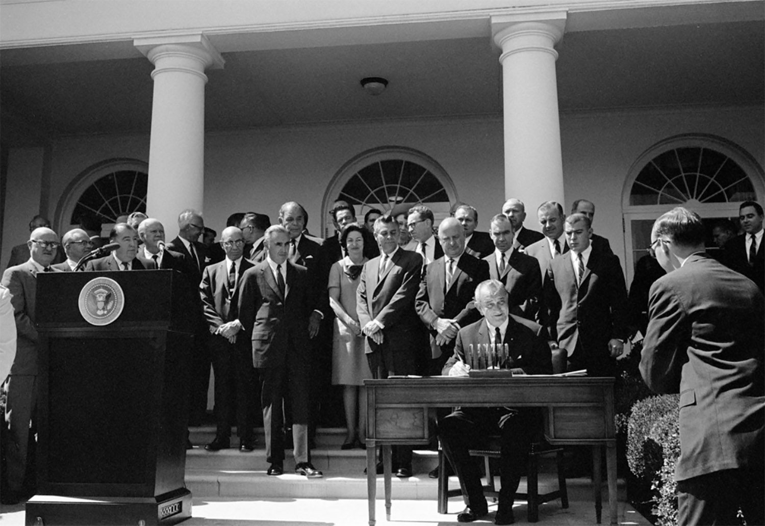 On September 9, 1966, around 200 people gathered in the White House Rose Garden as President Lyndon B. Johnson signed the Motor Traffic and Motor Vehicle Safety Act and the Highway Safety Act. President Johnson told them that nearly three times as many Americans had died in traffic accidents in the 20th century as died 'in all our wars.' On September 9, 1966, around 200 people gathered in the White House Rose Garden as President Lyndon B. Johnson signed the Motor Traffic and Motor Vehicle Safety Act and the Highway Safety Act.