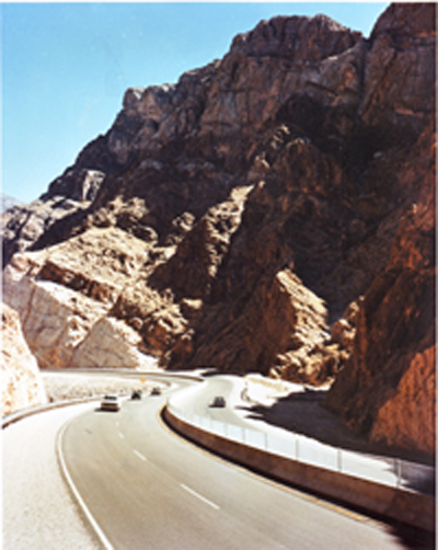 Arizona -The rugged beauty of the Virgin River Gorge is brought to light as this portion of Interstate 15 deftly winds its way through this colorful canyon completed 1973