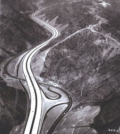 California - Interstate Route 405, the eight-lane San Diego Freeway in Los Angeles County crosses over Sepulveda Boulevard near the massive Mulholland Cut.