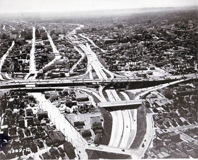 Looking southerly along Harbor Freeway showing Alpine Street overcrossing.  Four -level traffic interchange structure in center. ( California Department of Public Works photo)