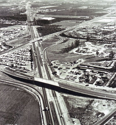 Santa Ana Freeway, with Ball Road overcrossing in foreground. Disneyland is on the right. (California Department  of Public Works photo)