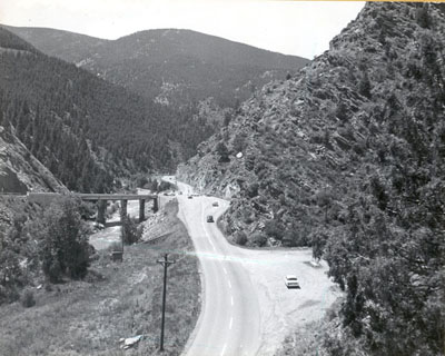 Colorado - Interstate Project I-70-3(1)250) - Ground view west (before construction) at Floyd Hill junction of I-70 and U.S. 6 showing normal daily traffic.  Interstate Route 70 westerly from Denver.