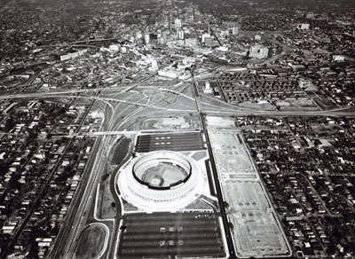 Georgia- An aerial view of the interchange in Atlanta between Interstate Routes 20 (Right - Left) and 75 (Bottom - Top), Atlanta's new major league stadium dominates the foreground and the ever changing skyline makes a striking backdrop.