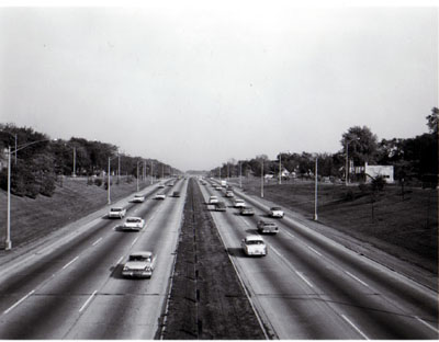 Congress St. Expressway (Interstate 90) from 17th st. overpass looking East, showing depressed section with good landscaping, steel cable guard rail, 10 foot paved shoulder, 24 foot median.  Residential Area.  Chicago, Illinois.  Photo by T. W. Kines 10-12-60