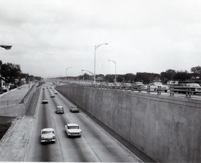 View of Congress Street Expressway (I-90) showing exit ramp from Congress Street Expressway to Harlem Avenue From West bound lane.  Looking east. Chicago Ill.