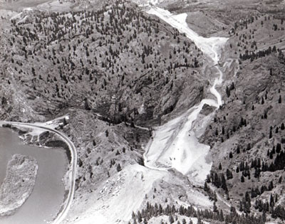 I-15 Between Helena and Great Falls. Missouri River Canyon construction underway. Existing road show in lower and upper left. Bridge crossing of Missouri River at top center.