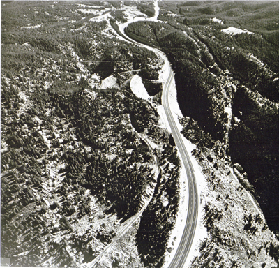 Montana - I-90, Homestake Pass east of Butte\.- Continental divide facing west.  Rest Area in upper center.