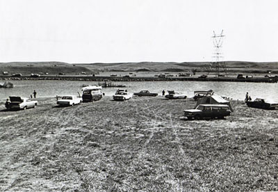 North Dakota- This lake is impounded by Sweet Briar Dam, which is a section of Interstate 94.  The use of the highway as dam was made possible by the cooperation of Federal, State and local agencies.