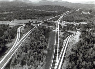 New York - A view along the 23-mile section of the Adirondack Northway (Interstate Route 87) which was adjudged America's Most Scenic New Highway of 1966 by Parade Magazine.  The section, between Lake George and Potterville in Warren County, is part of the 176-mile-long Albany-to-Canada Expressway.