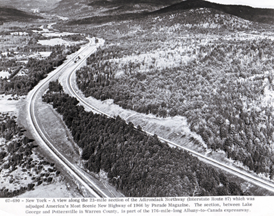 New York- A view along the 23-mile section of the Adirondack Northway (Interstate Route 87) which was adjudge America's Most Scenic New Highway of 1966 by Parade Magazine. The section, between Lake George and Potterville in Warren County, is part of the 176-mile-long Albany-to-Canada expressway. 