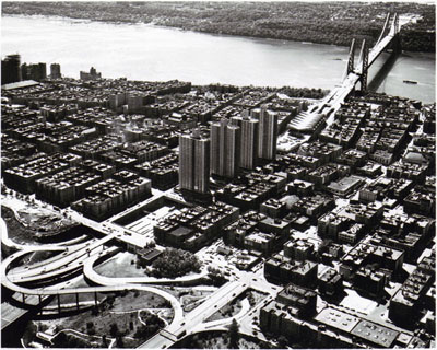 New York- The Trans-Manhattan Expressway crossing the island of Manhattan.  This is the most outstanding example of utilization of air rights in the country.  Four 32 story apartment building and the Port of New York Authority bus terminal are shown spanning the 12 land freeway.  Photo by Port of New York Authority.