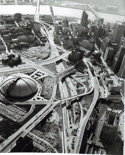 Pennsylvania - Pittsburgh, I-79 Still under construction, the Crosstown Boulevard penetrates the east end of the Golden Triangle.  Completion of this facility will provide the triangle with express access on all three sides.  Dome at left is unique Public Auditorium with retractable roof.