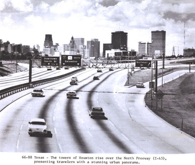 Texas - The towers of Houston rise over the North Freeway (I-45), presenting travelers with a stunning urban panorama.