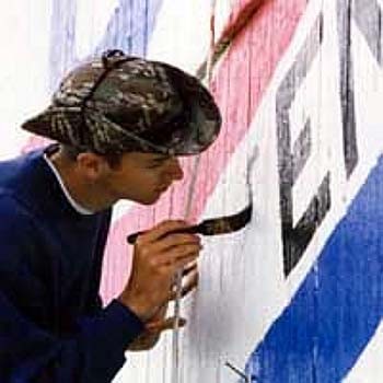 Bicentennial barn artist Scott Hagan sketches and paints each logo by hand.