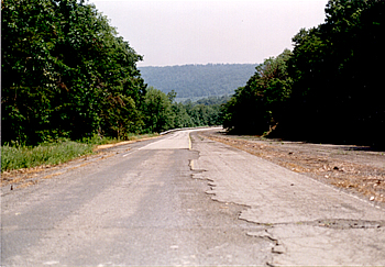 The eastbound lanes of the abandoned turnpike west of Ray's Hill tunnel.