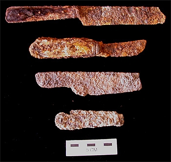 Close-up of primitive knives.