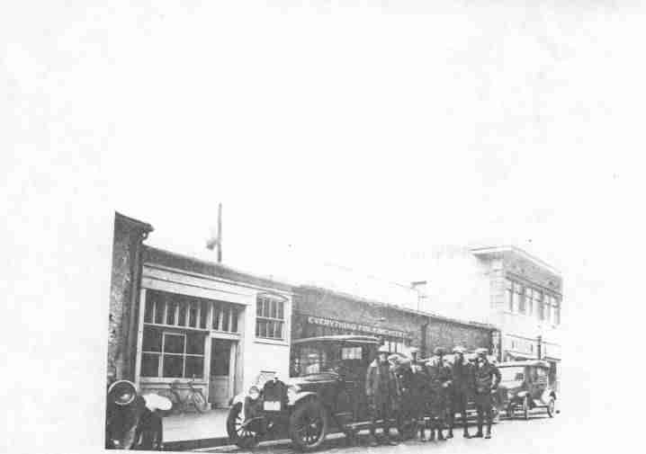 Field crew ready to depart for season on Direct construction work. 1923 or 1924. Note two pieces of automotive equipment Preston Lenford, Chief of Party, on left