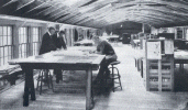 South Yarmouth 'Workshop' of the National Highways Association. The Drafting-Room where every highway in the country is plotted on its respective State map, constantly revised and corrected.