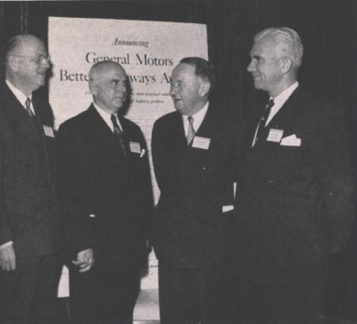 Three of the judges in the General Motors Better Highways Awards competition shown with Albert Bradley, General Motors executive vice president. Left to right: Ned H. Dearborn, Commissioner Thomas H. MacDonald, Mr. Bradley and Mr.Tallamy