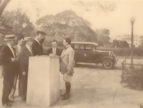 On September 14, 1925, Dr. S. M. Johnson (3rd from left), at the Zero Milestone with AAA officials as Major Bernard S. McMahan (on right), begins a trip to log Lee Highway for AAA strip maps and a Lee Highway tourist guide.