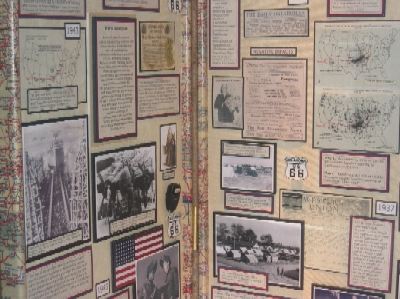 An additional view of the left and center panels, including images and information about Route 66 during the Dust Bowl and World War II.