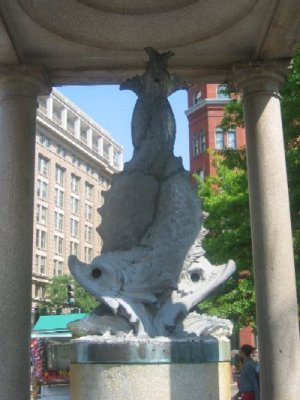 The entwined fish of "Temperance" enhance the statue's reputation at the ugliest in the city.