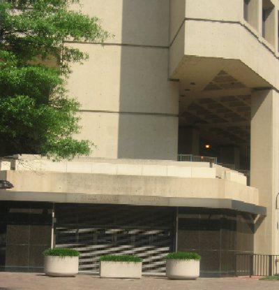 The Pennsylvania Avenue side of the J. Edgar Hoover Federal Bureau of Investigation (FBI) Building no longer displays the presidential panels that were shown in 1989.  Hoover headed the FBI from 1924 until his death in 1972.