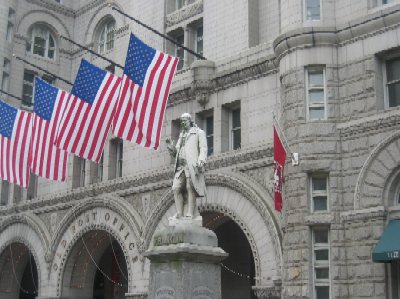 This statue of Benjamin Franklin, a postmaster during the Colonial period, sits in front of the Old Post Office Building.