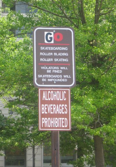 This sign near the Pulaski statue is supposed to warn visitors that "NO" skateboarding, roller blading, or roller skating is allowed in Freedom Plaza, but one of those visitors used a sticker to change the "NO" to "GO."