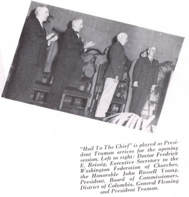 President Truman (right) arrives at the 1946 Highway Safety Conference following his introduction by General Fleming (second from right).