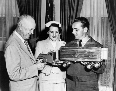 As part of his safety initiative, President Eisenhower met with Truck Driver of the Year Gomer W. Bailey and his wife in June 1954.  The Baileys, of Denver, Colorado, presented the President with a model truck for his grandson David.  The President and Mr. Bailey discussed highway safety and their shared passion for fishing in the fields and streams of Colorado.  Mr. Bailey told reporters, "He's such a swell guy."  (Courtesy Dwight Eisenhower Library)