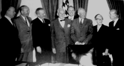 On January 13, 1960, President Eisenhower signed Executive Order 10858 giving a formal status to the Committee for Traffic Safety.  Committee Chairman William Randolph Hearst, Jr., is second from the left.